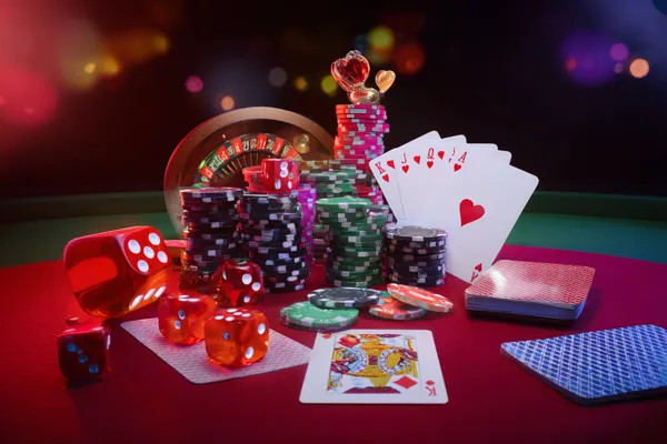 SAGISAGPH Mobile Casino — Play anytime, anywhere A player using their smartphone during a festive local event, representing SAGISAGPH’s fully mobile-friendly casino.